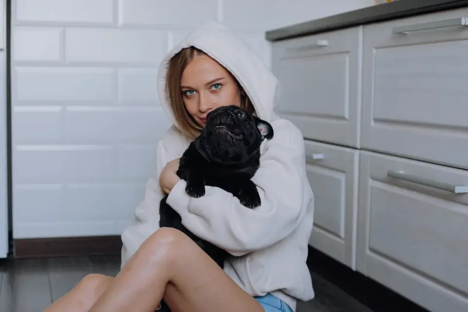 Dog owner preparing a meal